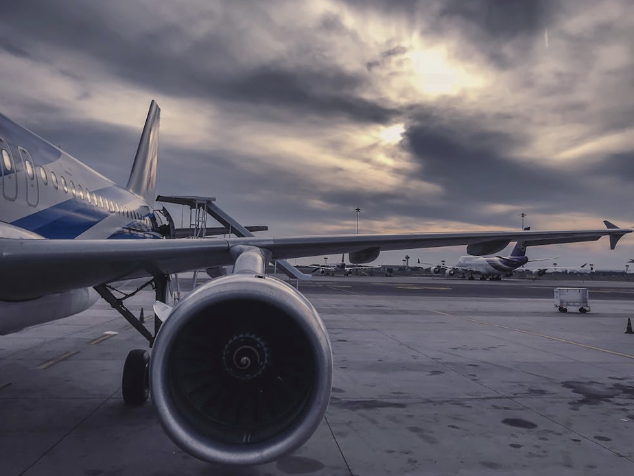 A gray airliner on the tarmac, ready for departure